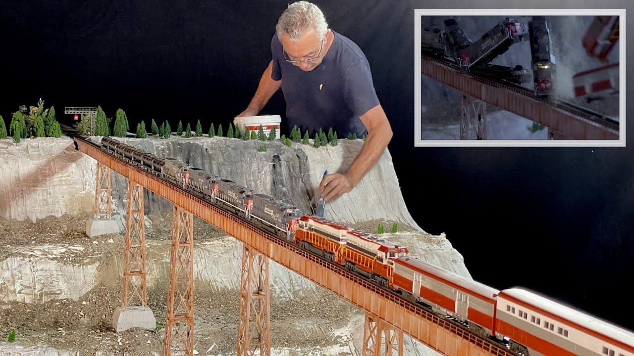 Head on train crash movie, on a bridge, derailment after collision, behind the scenes. HO scale fail rootF IMG 66e05282af765
